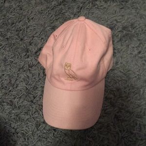Pink hat with owl logo